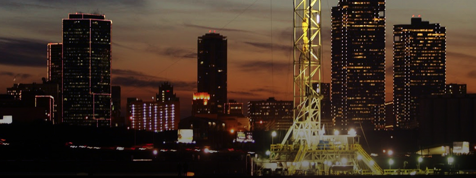 Image showing a rig near a city skyline